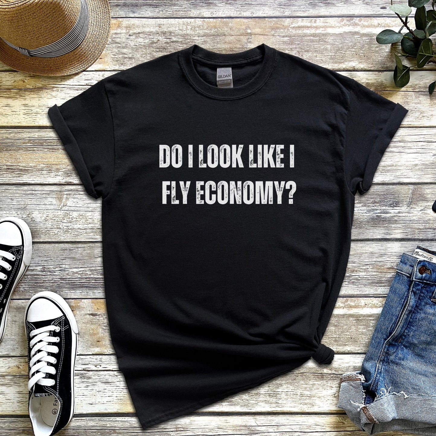 Funny travel t-shirt with 'Do I look like I fly economy?' for first-class flyers