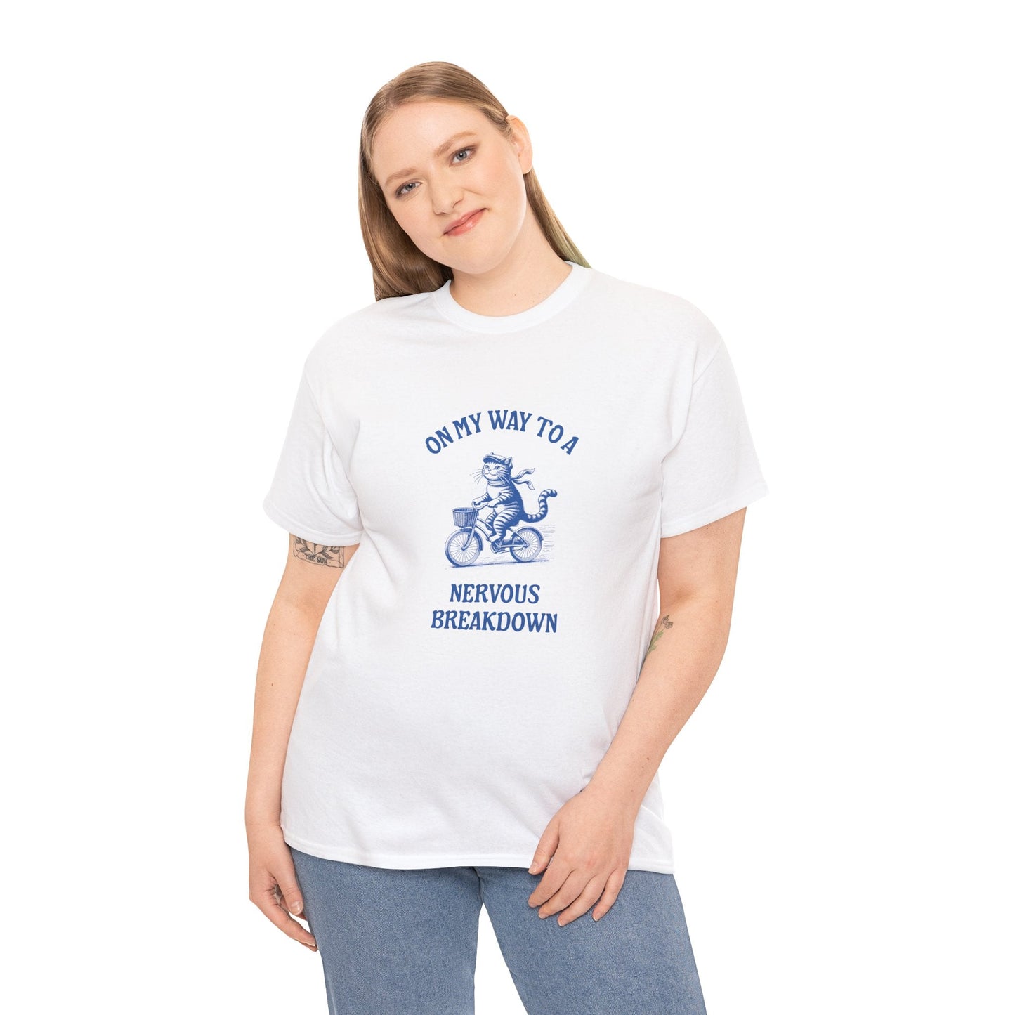Funny mental health t-shirt with 'On my way to a nervous breakdown' and cartoon cat, perfect for stress awareness and empathy.