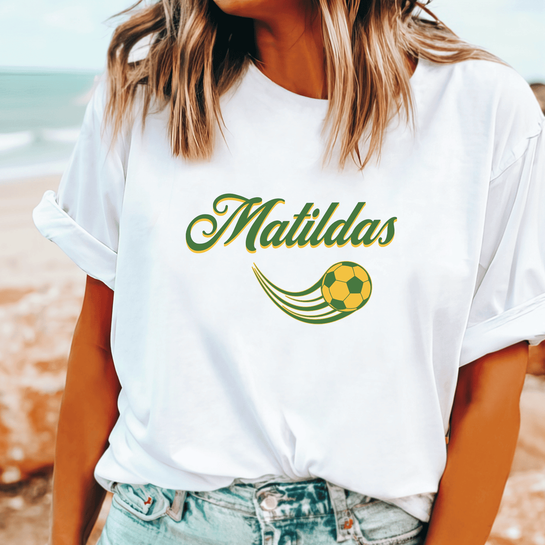 Matildas support white t-shirt with green and gold Matildas on woman