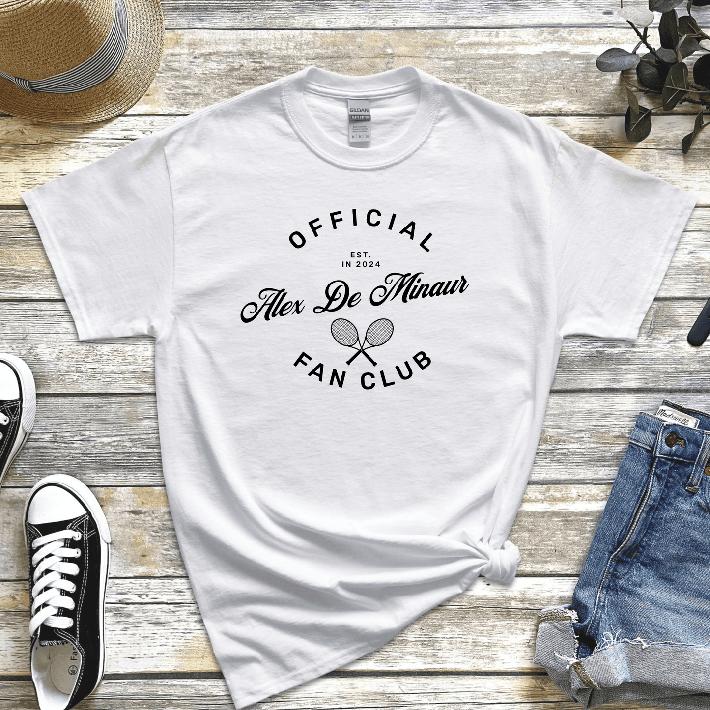 Support Aussie tennis with the 'Alex De Minaur Fan Club' t-shirt—perfect for fans of this rising star!