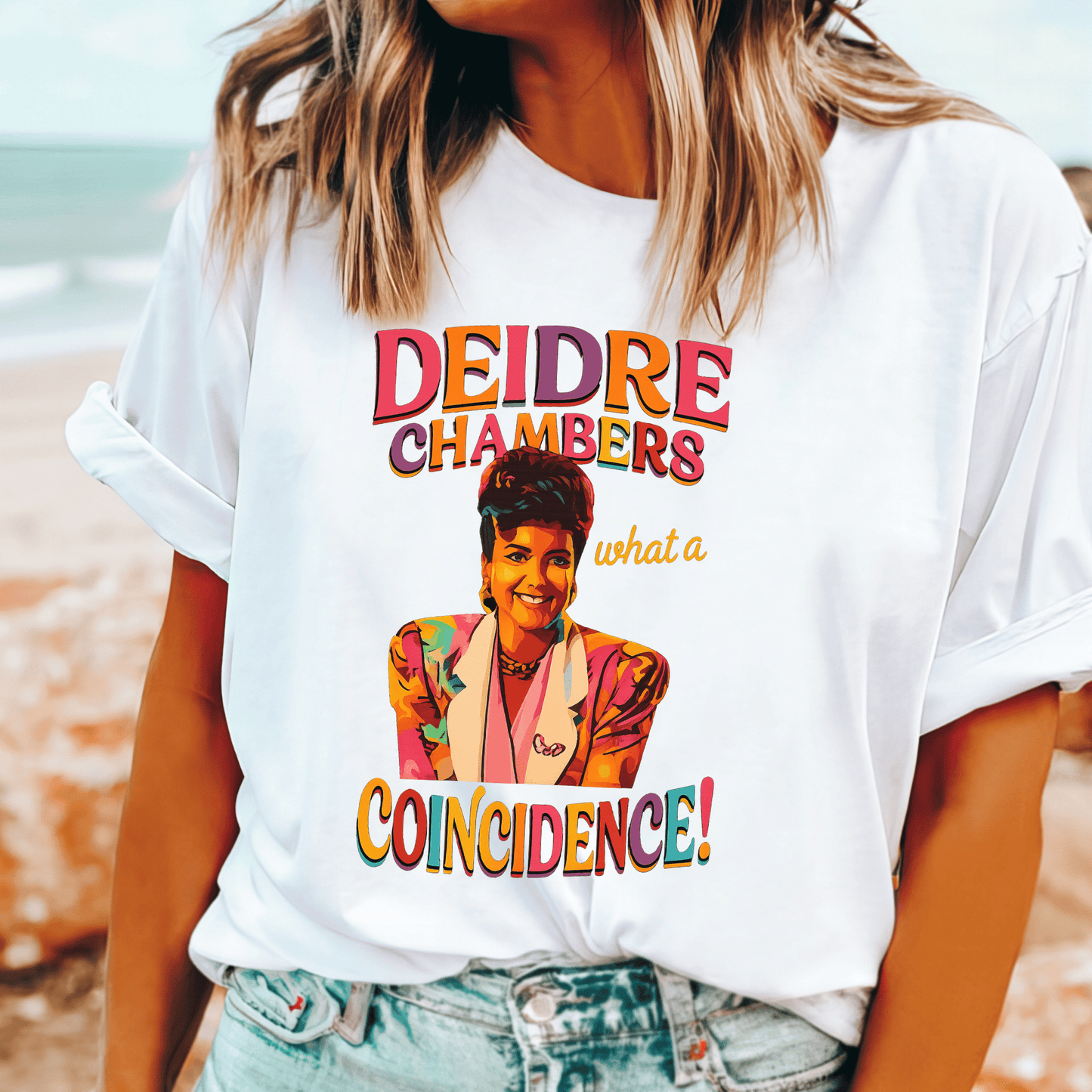 Muriel’s Wedding t-shirt featuring Deidre Chambers cartoon and “What a coincidence!” quote