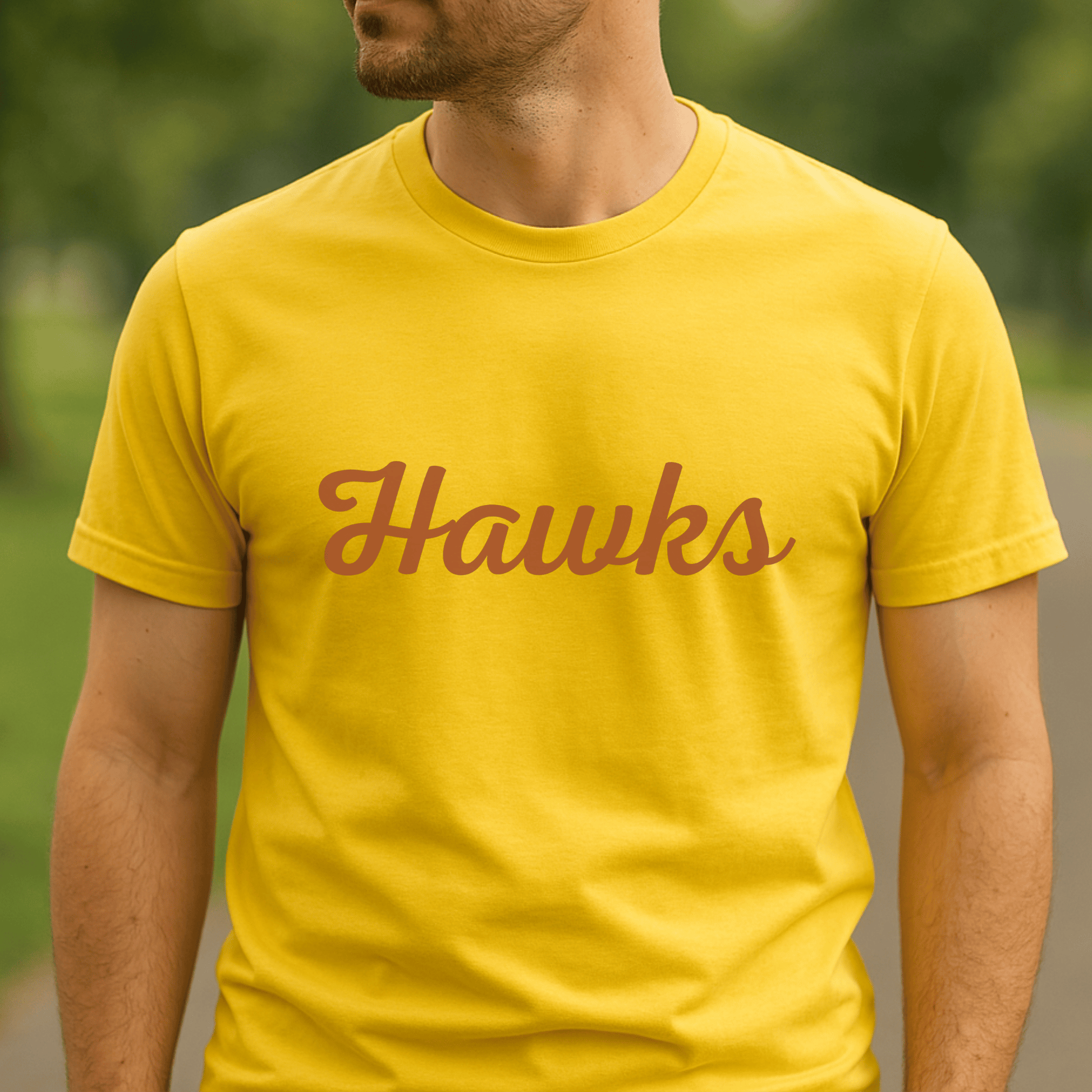 Classic “Hawks” t-shirt in team colours — a must-have for Hawthorn Hawks supporters.