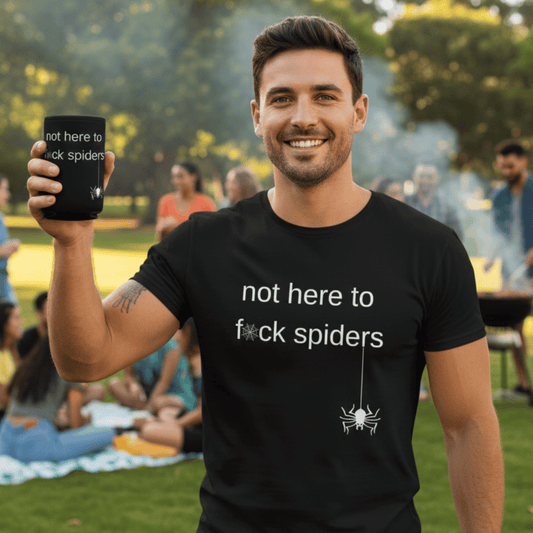 Man wearing a blacknoth hre to fuck spiders t-shirt holding a matching stubby holder