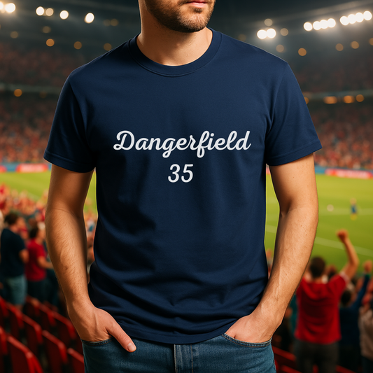 Person wearing a navy blue t-shirt with 'Dangerfield 35' text in a stadium setting