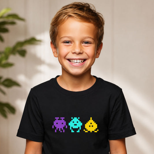 Child wearing space invaders characters on a black t-shirt