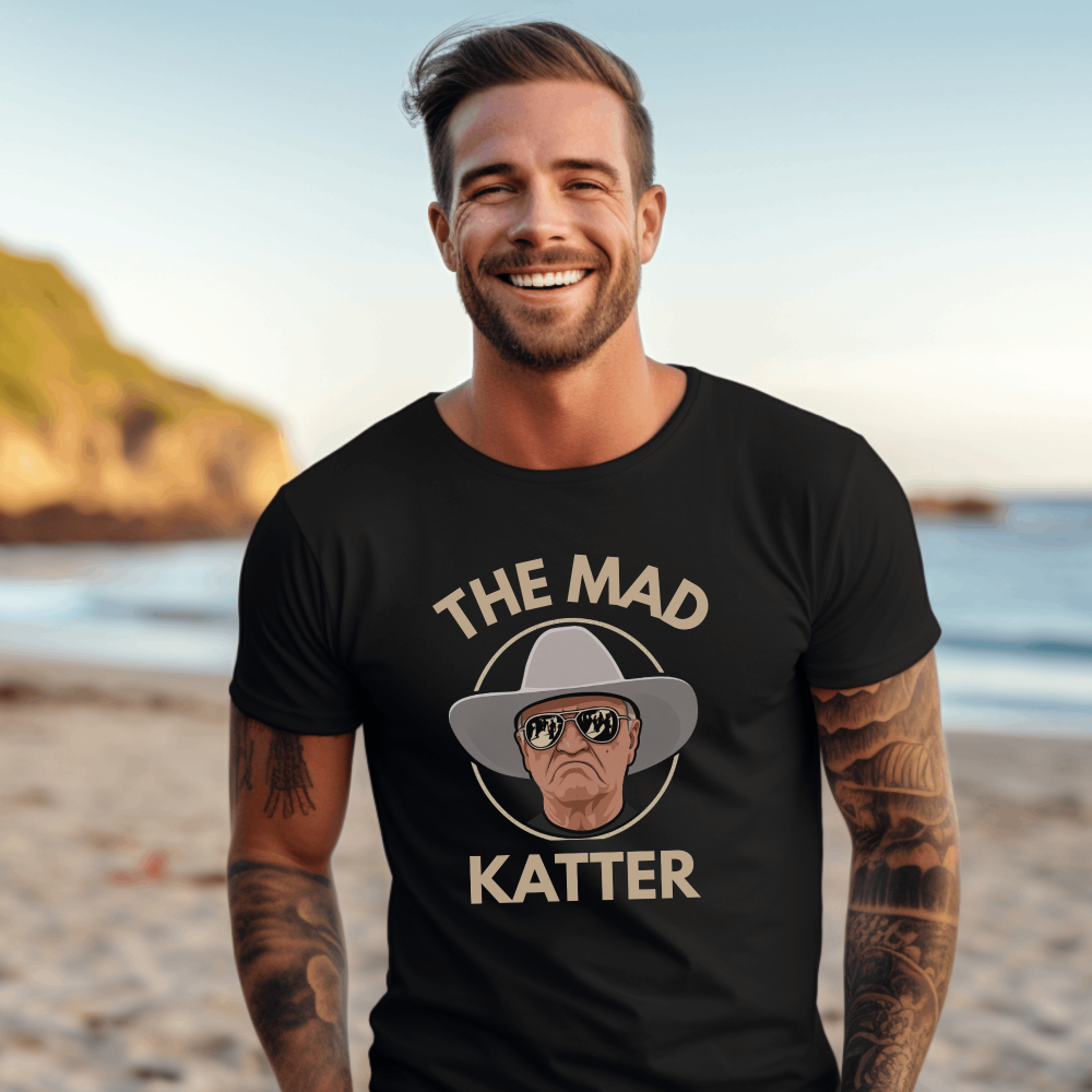 Cartoon illustration of Bob Katter with "The Mad Katter" text on a black t-shirt.