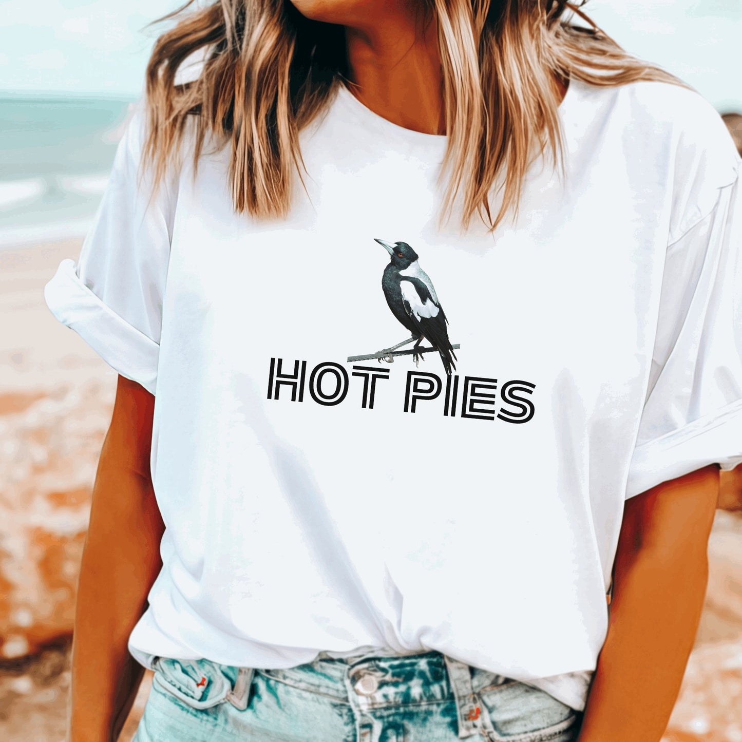 Collingwood AFL t-shirt with Hot Pies slogan and magpie graphic