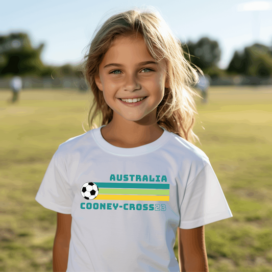 Kids retro Matildas t-shirt with Kyra Cooney-Cross name and number in green and gold